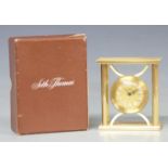 Seth Thomas French-made brass cased boudoir alarm clock, the gilt dial with Roman cartouche figures,
