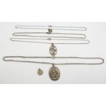 Four silver St Christopher pendants and silver chains