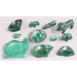 A collection of malachite including carved animals, pin trays and ashtrays