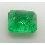 A loose emerald cut emerald measuring approximately 7.8ct