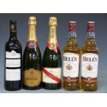 Five bottles of assorted alcohol. Mercier brut reserve Champagne, G.H Mumm brut Champagne, La