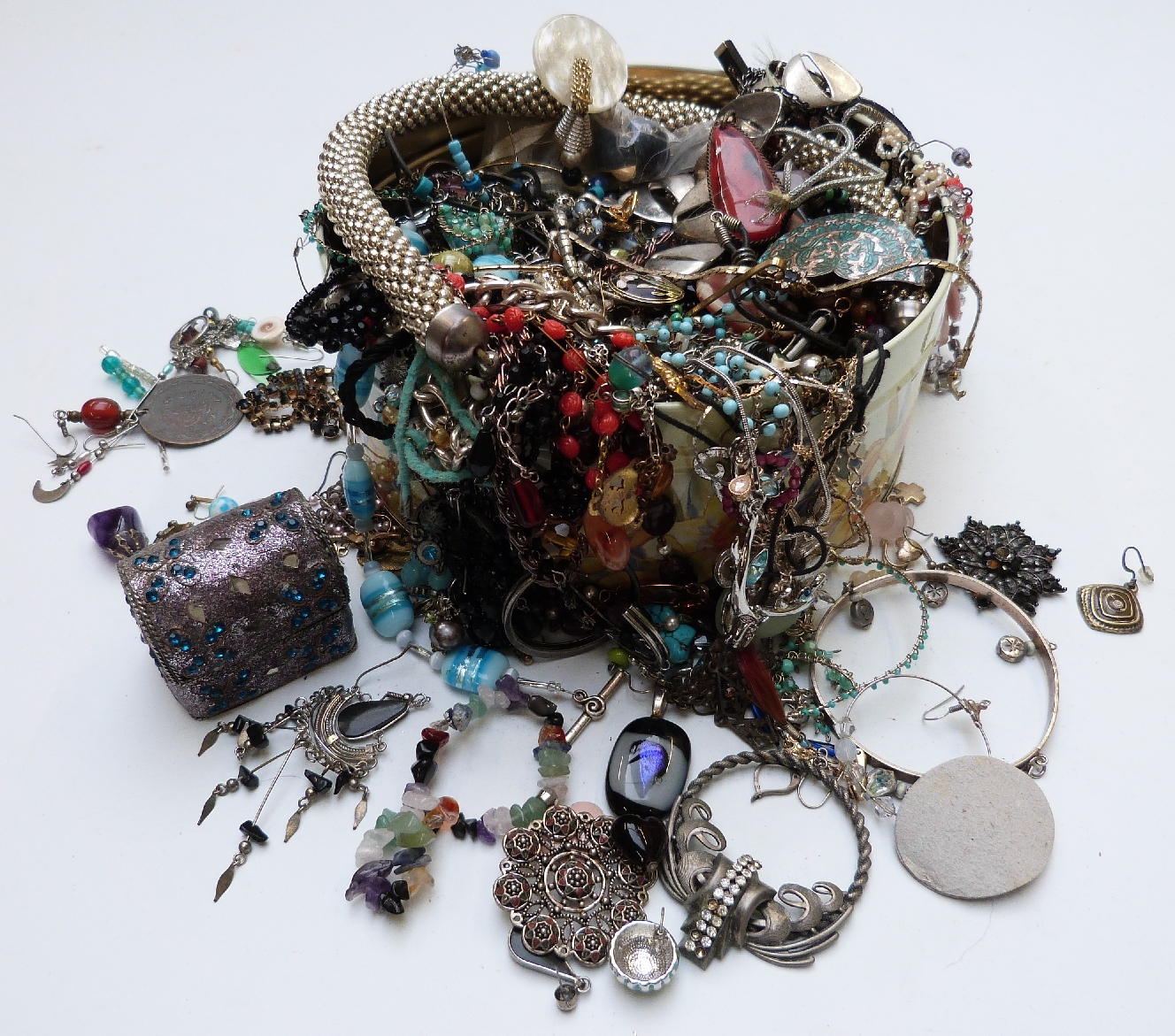 A collection of costume jewellery including earrings, necklaces and brooches