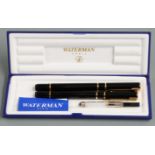 Waterman pen set comprising fountain and ballpoint pens, both with black bodies and gold plated