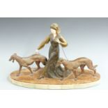 Art Deco figurine of a lady walking two hunting dogs, possibly R Scali, raised on a two tone