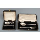 Cased hallmarked silver fork and spoon set together with a cased hallmarked silver baby's spoon and