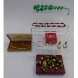 A collection of costume jewellery including a Ciro necklace, earrings, silver filigree necklace