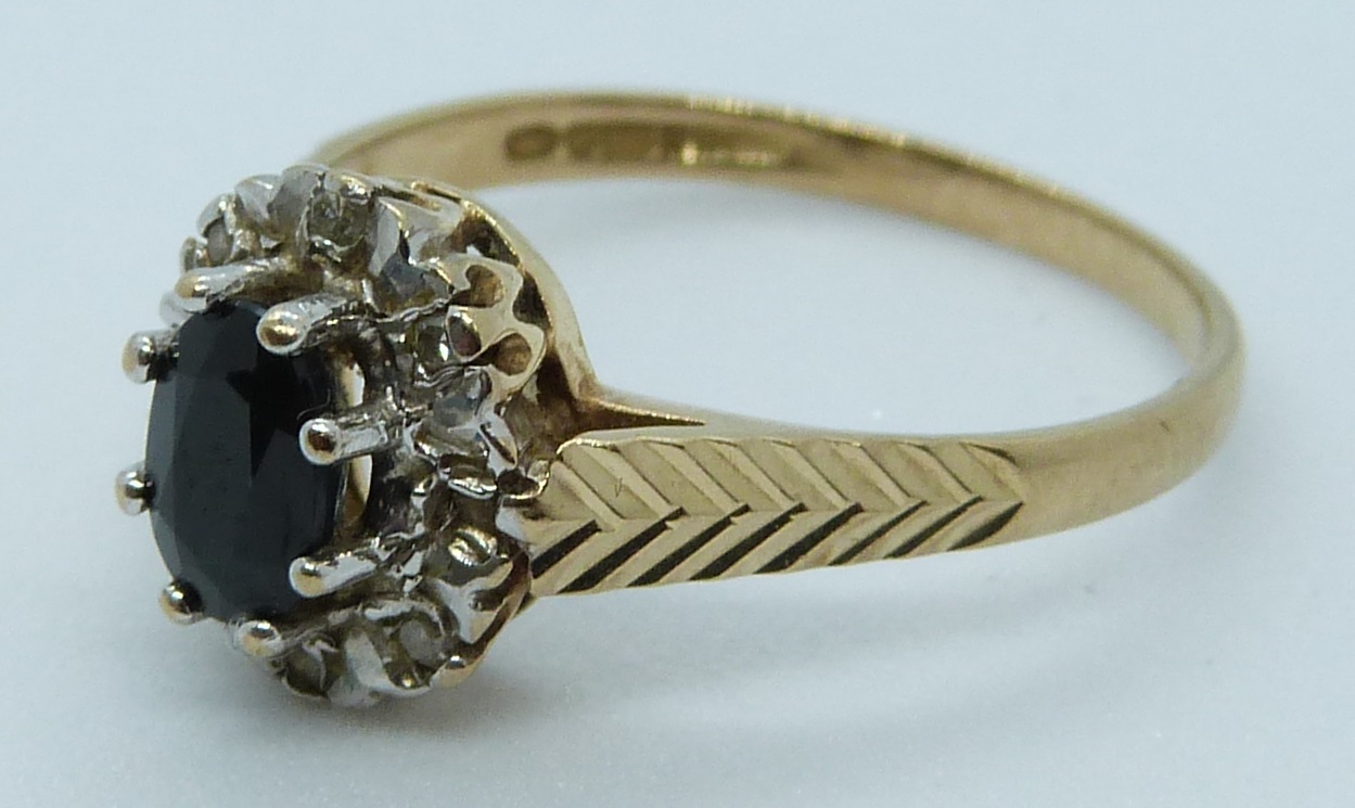 A 9ct gold ring set with a sapphire and diamonds, 2g, size M - Image 3 of 3