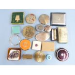 A collection of compacts including Stratton, Vogue, Art Deco etc and a small silver lidded blue