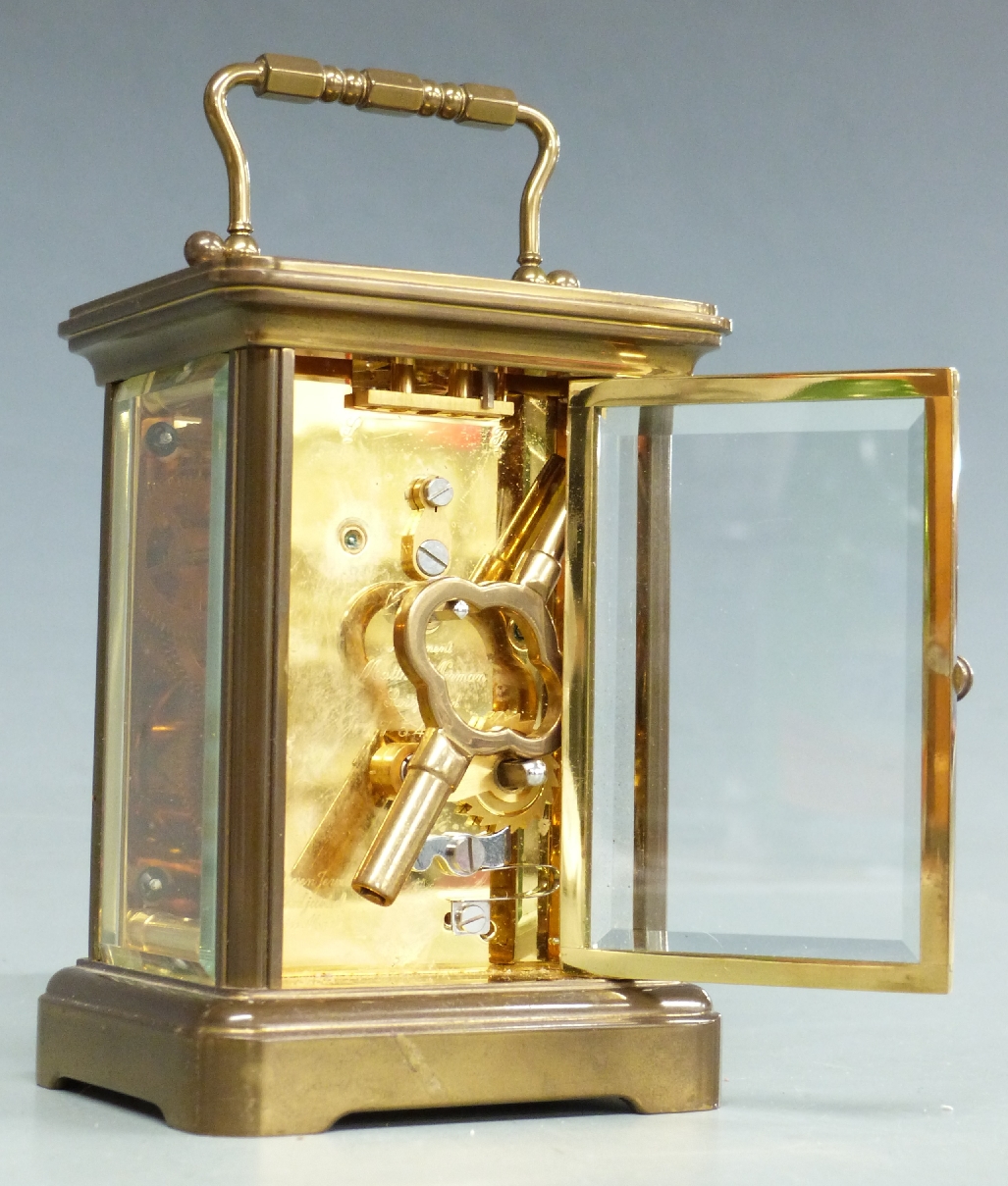 A 20thC brass carriage clock by Matthew Norman in corniche style case, the Roman enamel dial with - Image 3 of 4