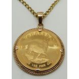 A 9ct gold pendant set with a 1984 1oz fine gold Krugerrand, on 9ct gold chain, 48.1g