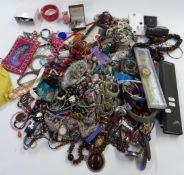 A collection of jewellery and watches including Swatch, amethyst pendant, earrings, necklaces,