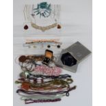 A collection of costume jewellery including Swarovski crystal necklace in original box, agate, white