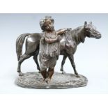19thC bronzed figure of a girl with horse on naturalistic base, H14.5cm
