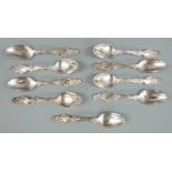 Art Nouveau style set of nine American white metal teaspoons in the lily pattern by the Whiting