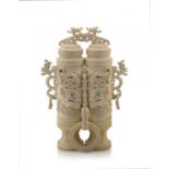 A Chinese ivory 'champion' vase and cover