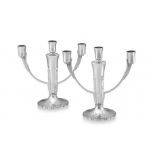 A pair of George VI silver three-light candlesticks, Robert Edgar Stone, London, 1948