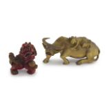 A Chinese giltwood figure of a buffalo and a small boy