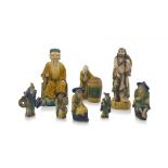 A group of eight Chinese sancai-glazed stoneware figures of sages and tradesmen, 20th century