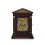 A German oak bracket clock, retailed by H F Seale, Cape Town, 20th century