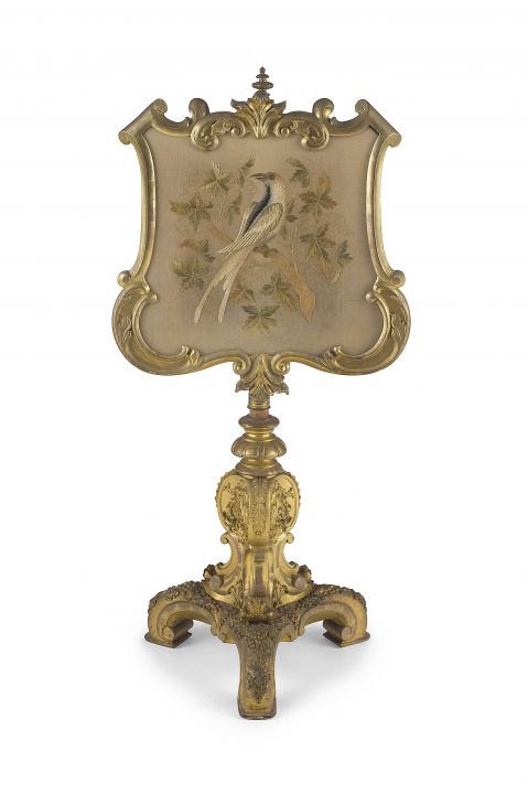 A Victorian giltwood and needlework pole screen