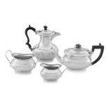 A late Victorian silver three-piece bachelor’s tea set, Samuel Smith, London, 1894