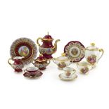 A Hutschenreuther maroon and gilt part coffee set, mid 20th century
