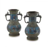 A pair of Chinese champlevé enamelled vases, late 19th/early 20th century