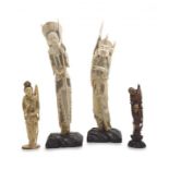 A pair of Chinese ivory figures of archers, Qing Dynasty, 19th/20th century
