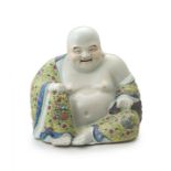 A Chinese famille-rose figure of Pu-Tai, early 20th century