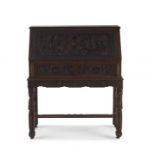 A Chinese carved teak fall-front bureau, 20th century