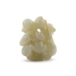 A Chinese pale green jade carving of three monkeys, late 19th century