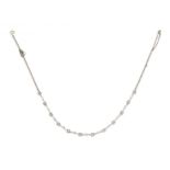 An Edwardian diamond, pearl and gold necklet