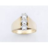 Three-stone diamond and 18ct gold ring