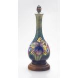 A Moorcroft 'Orchid' pattern table lamp, 20th century