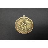 A 9ct gold St Christopher medallion, 2.5cm diameter, 5.8g.