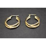 A pair of 14k gold hoop earrings, 6.9g.