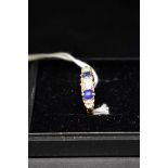 An 18ct gold sapphire and diamond five stone ring, total weight 3g.