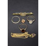 A 9ct gold bar brooch decorated central crown set split pearls; together with three 9ct gold gem set