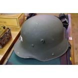 A World War I German Transitional helmet.