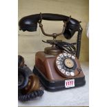 Two old Danish copper telephones.