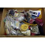 A quantity of cloth epaulettes, badges, braided tassels, belts and related.