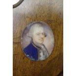 Attributed to Thomas Redmond, head and shoulders portrait miniature of a gentleman wearing a blue