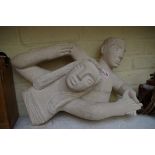 Josh Smith, a carved sandstone figure group, initialled and dated '92, 47cm wide.