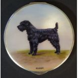 A good sterling silver and enamel circular snuff box, the hinged top finely painted with a Schnauzer