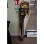 A vintage bamboo shooting stick; together with a silver mounted swagger stick; and two other items.