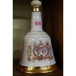 A 75cl 'Charles & Diana'Royal Wedding Bell's Whisky commemorative decanter.