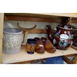 A mixed lot, to include a pair of walnut clogs; and a bargeware teapot and cover.