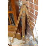 A Winsor & Newton beechwood folding artists easel; together with another folding easel; and one