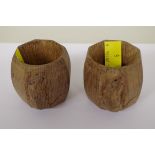 Two Robert Mouseman Thompson carved oak octagonal napkin rings.