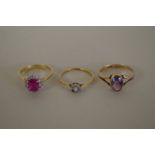 Three 18ct gold gem set rings.